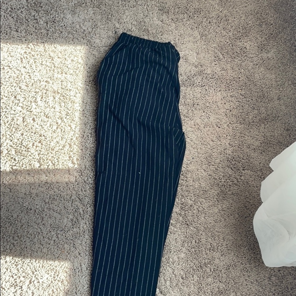 Small vertical striped trousers